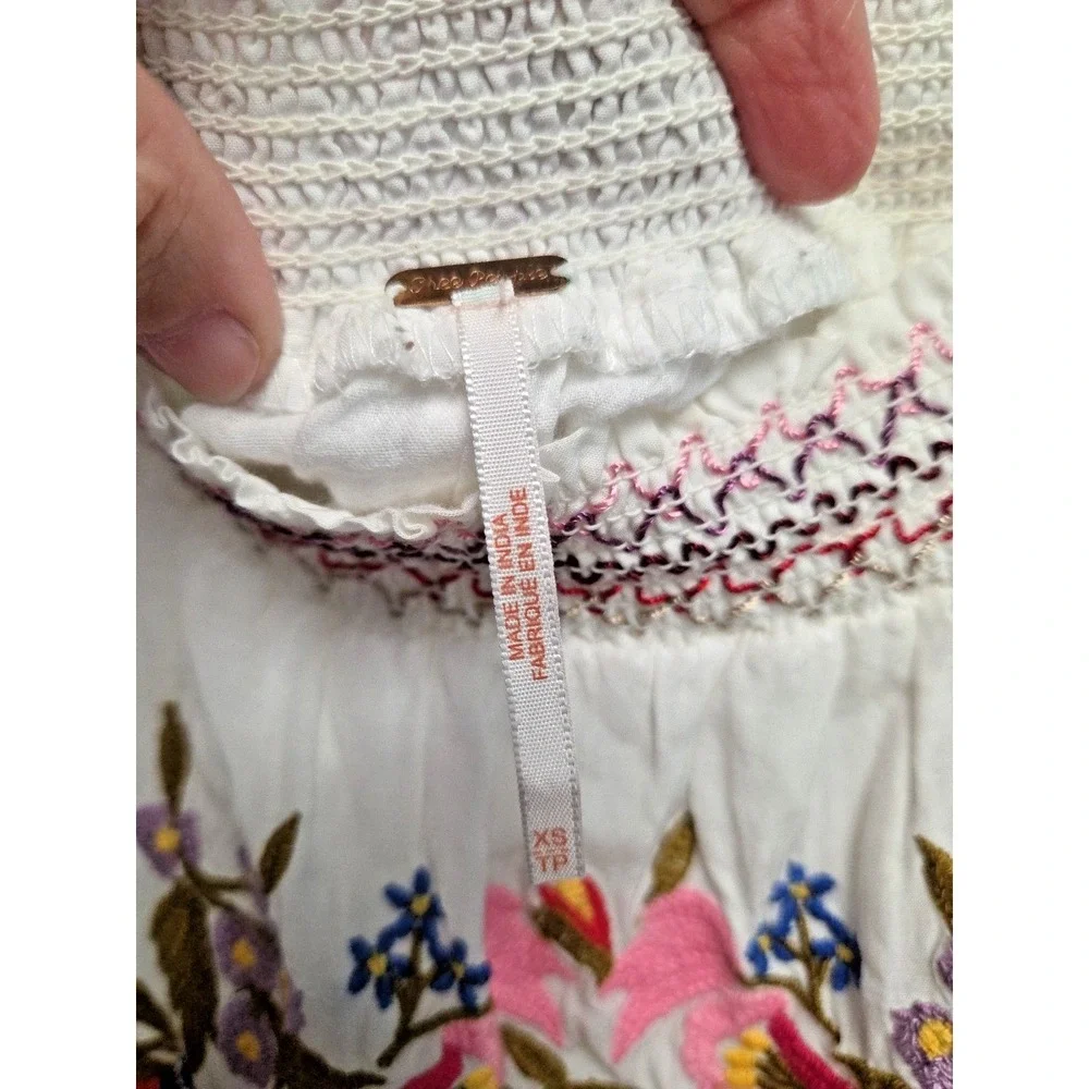 FREE PEOPLE XS Boho White Embroidered Mini Dress Smocked Off Shoulder Sunbeams - Picture 6 of 11